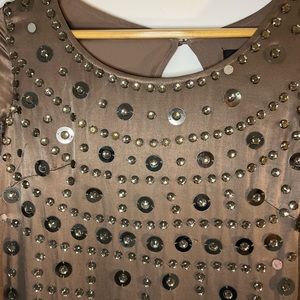 Ochre color, with shining details, size S, Shulami brand.